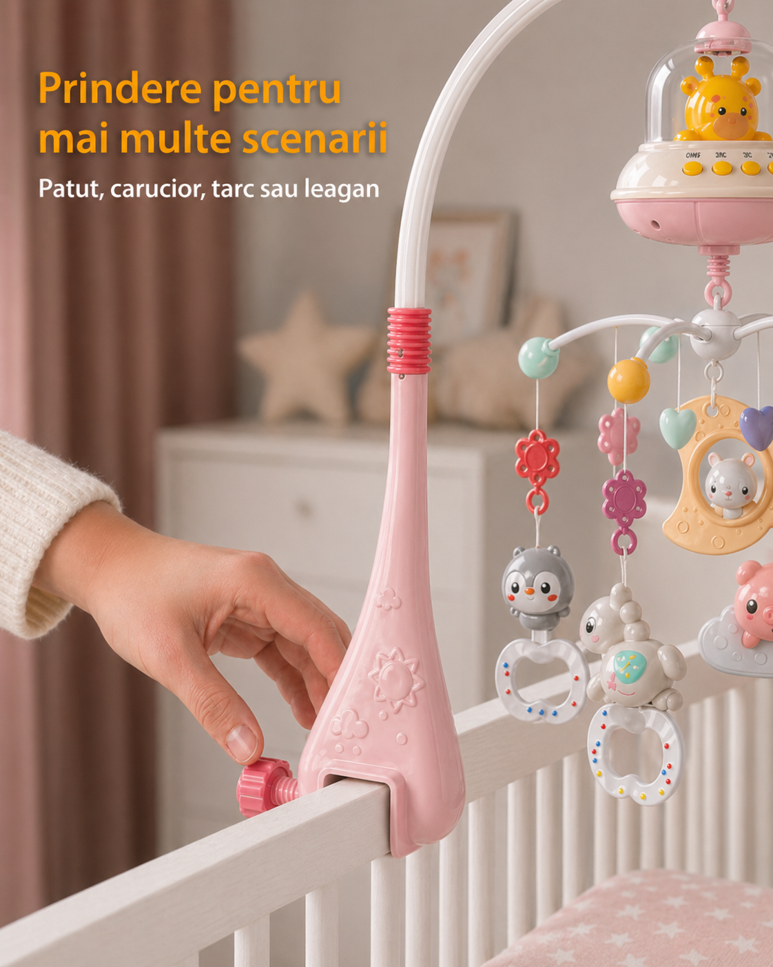 Sistem de prindere pentru carusel muzical roz pe patut sau carucior
